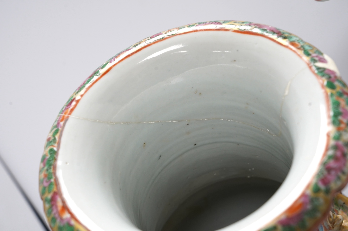 A pair of 19th century Chinese Canton famille rose vases, 36cm high. Condition - poor